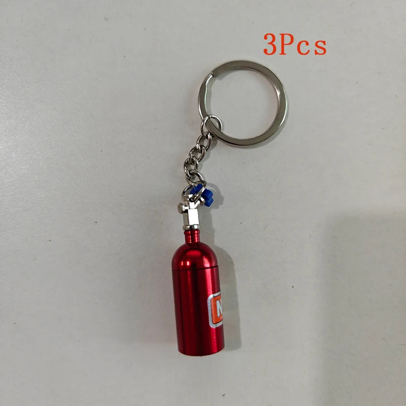 Ajrc 1/10 Simulation Climbing Car Universal Decorative Parts Nos Metal Simulation Nitrogen Bottle with Fixed Chain